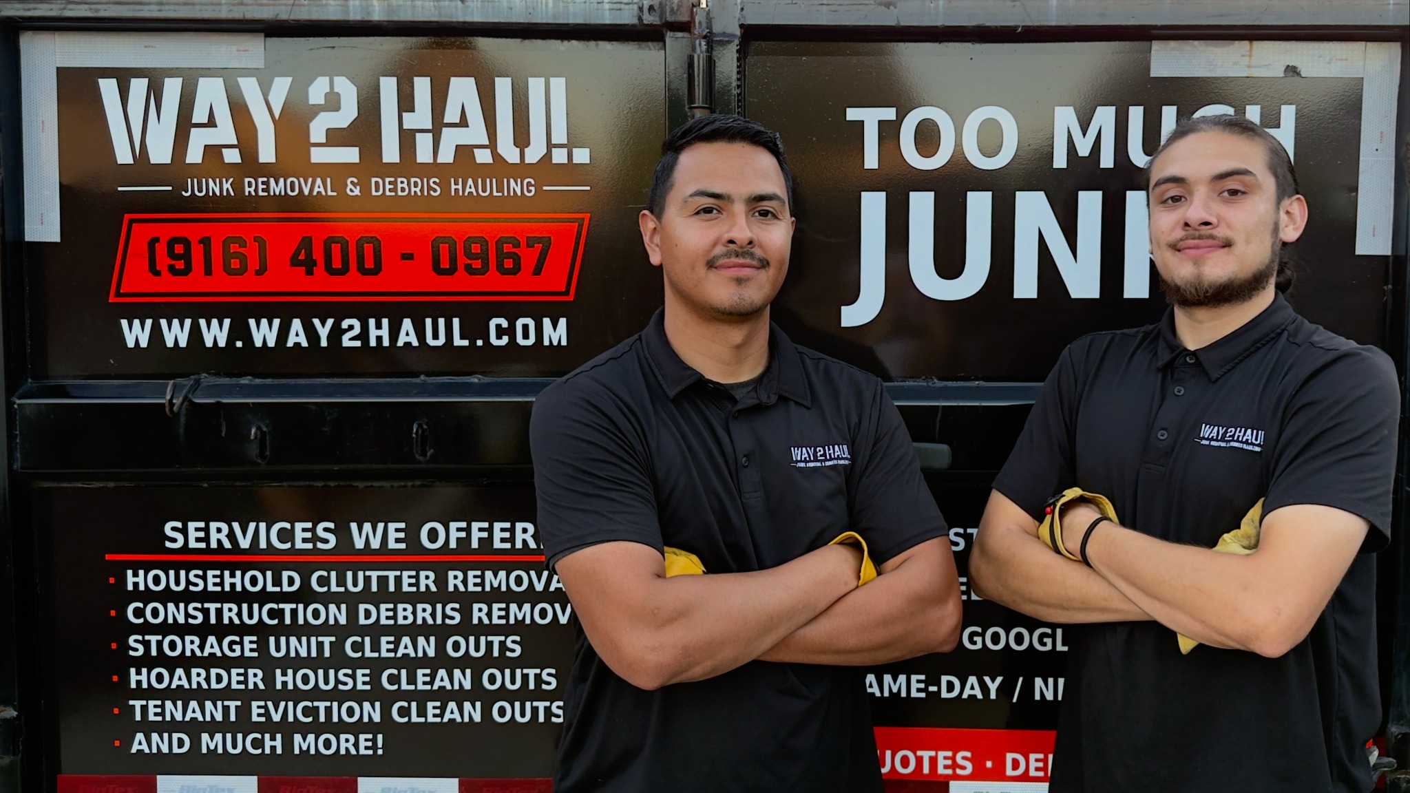 Way 2 Haul team standing in front of company dump trailer
